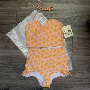 Kortni Jeane pink and orange swimsuit